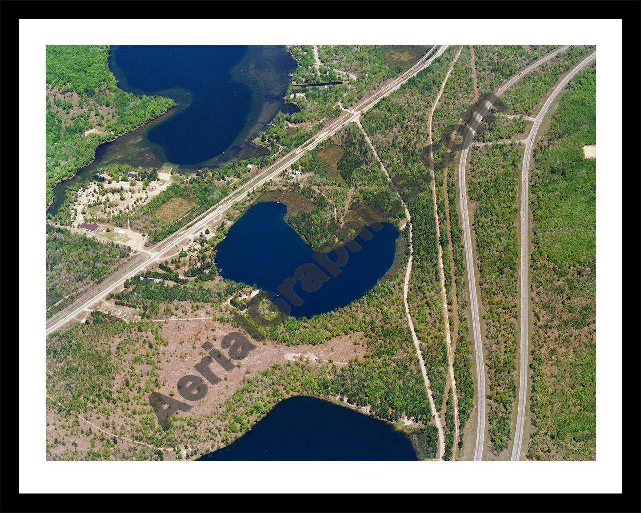 Aerial image of [5808] Horseshoe Lake in Crawford, MI with Black Metal frame