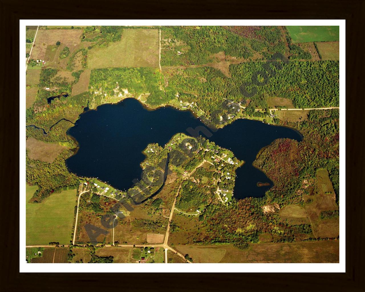 Aerial image of [5809] Horseshoe Lake in Montcalm, MI with Black Wood frame