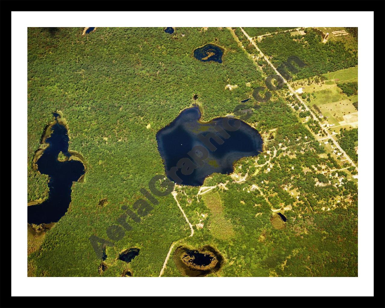 Aerial image of [5810] Horseshoe Lake in Ogemaw, MI with Black Metal frame