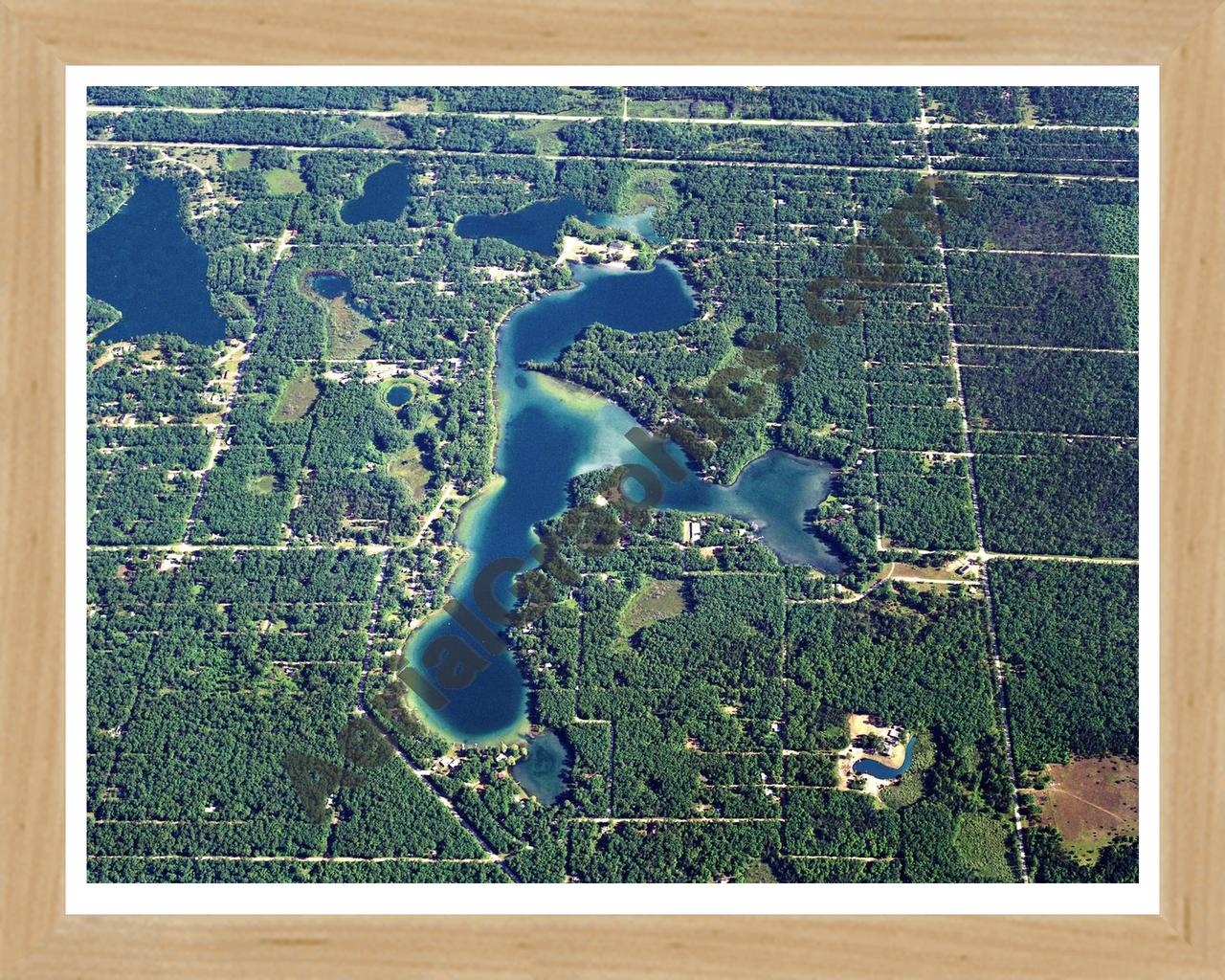 Aerial image of [5814] Idlewild Lake in Lake, MI with Natural Wood frame