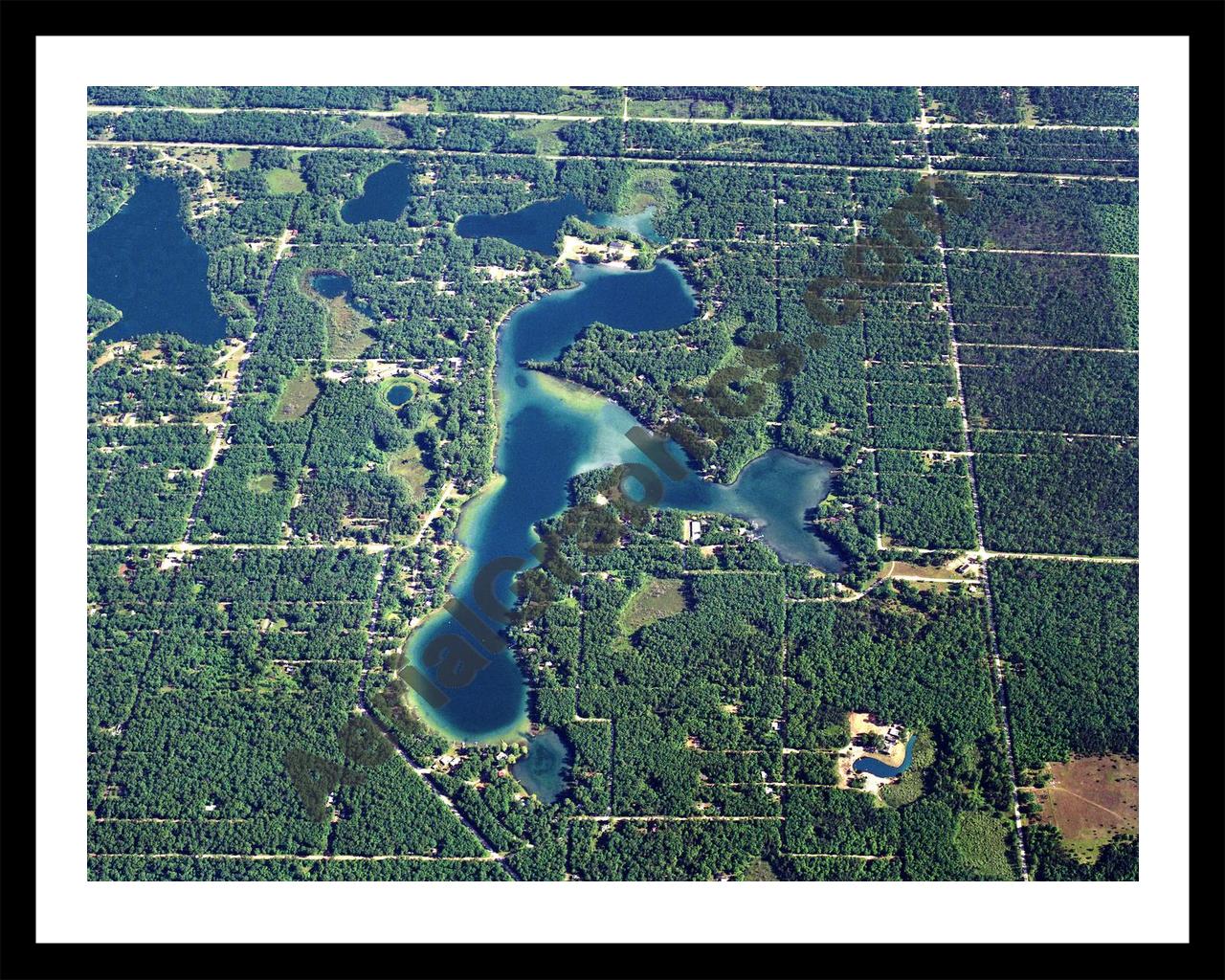 Aerial image of [5814] Idlewild Lake in Lake, MI with Black Metal frame