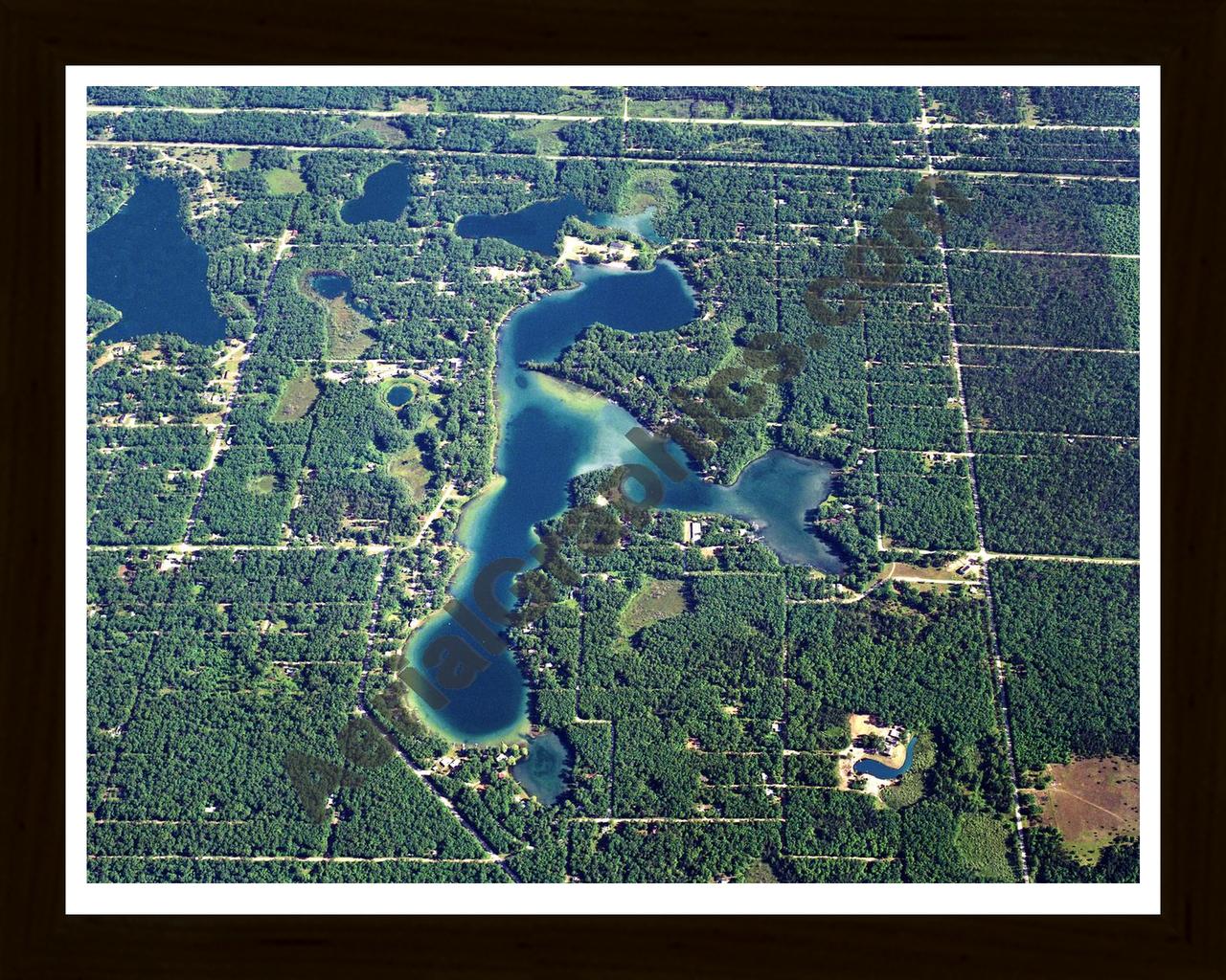 Aerial image of [5814] Idlewild Lake in Lake, MI with Black Wood frame