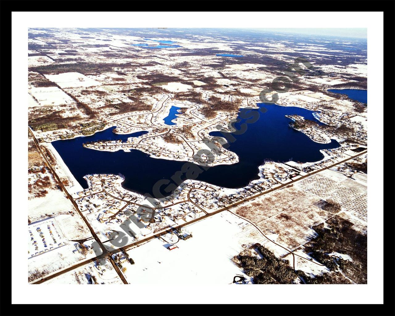 Aerial image of [5829] Lake Bella Vista in Kent, MI with Black Metal frame