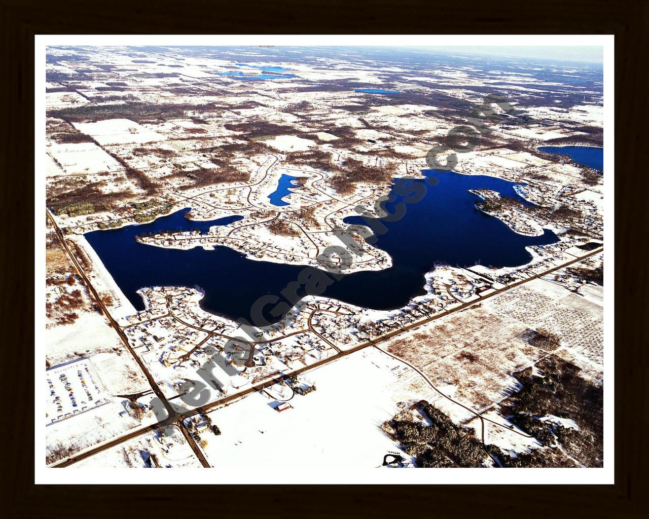 Aerial image of [5829] Lake Bella Vista in Kent, MI with Black Wood frame