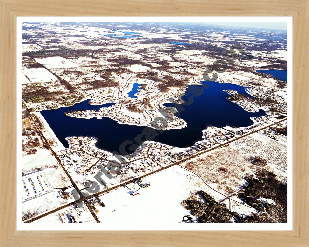 Aerial image of [5829] Lake Bella Vista in Kent, MI with Natural Wood frame