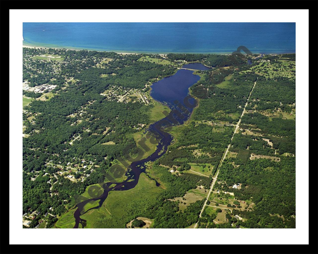 Aerial image of [5836] Lincoln Lake in Mason, MI with Black Metal frame