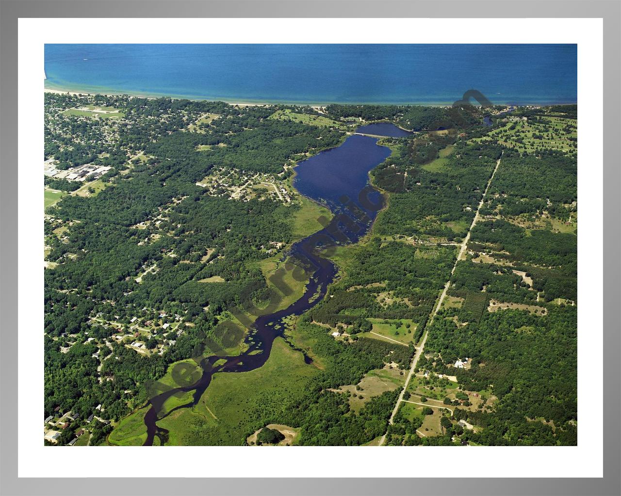 Aerial image of [5836] Lincoln Lake in Mason, MI with Silver Metal frame