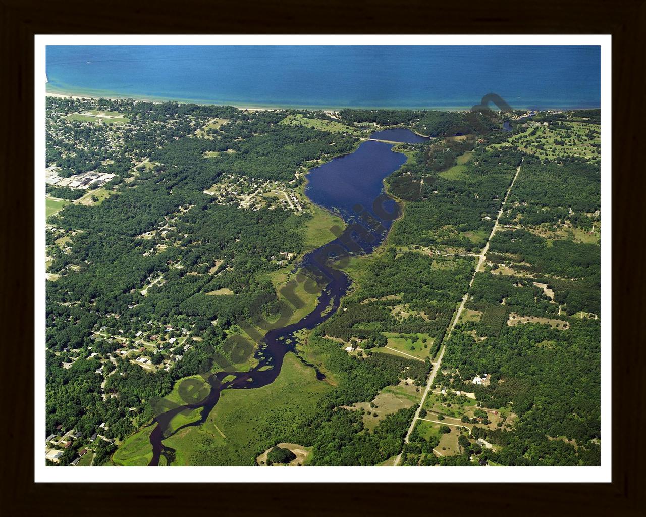 Aerial image of [5836] Lincoln Lake in Mason, MI with Black Wood frame