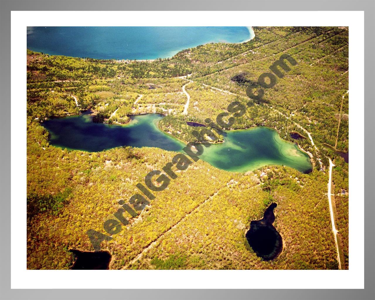 Aerial image of [5843] Little Wolf Lake in Montmorency, MI with Silver Metal frame