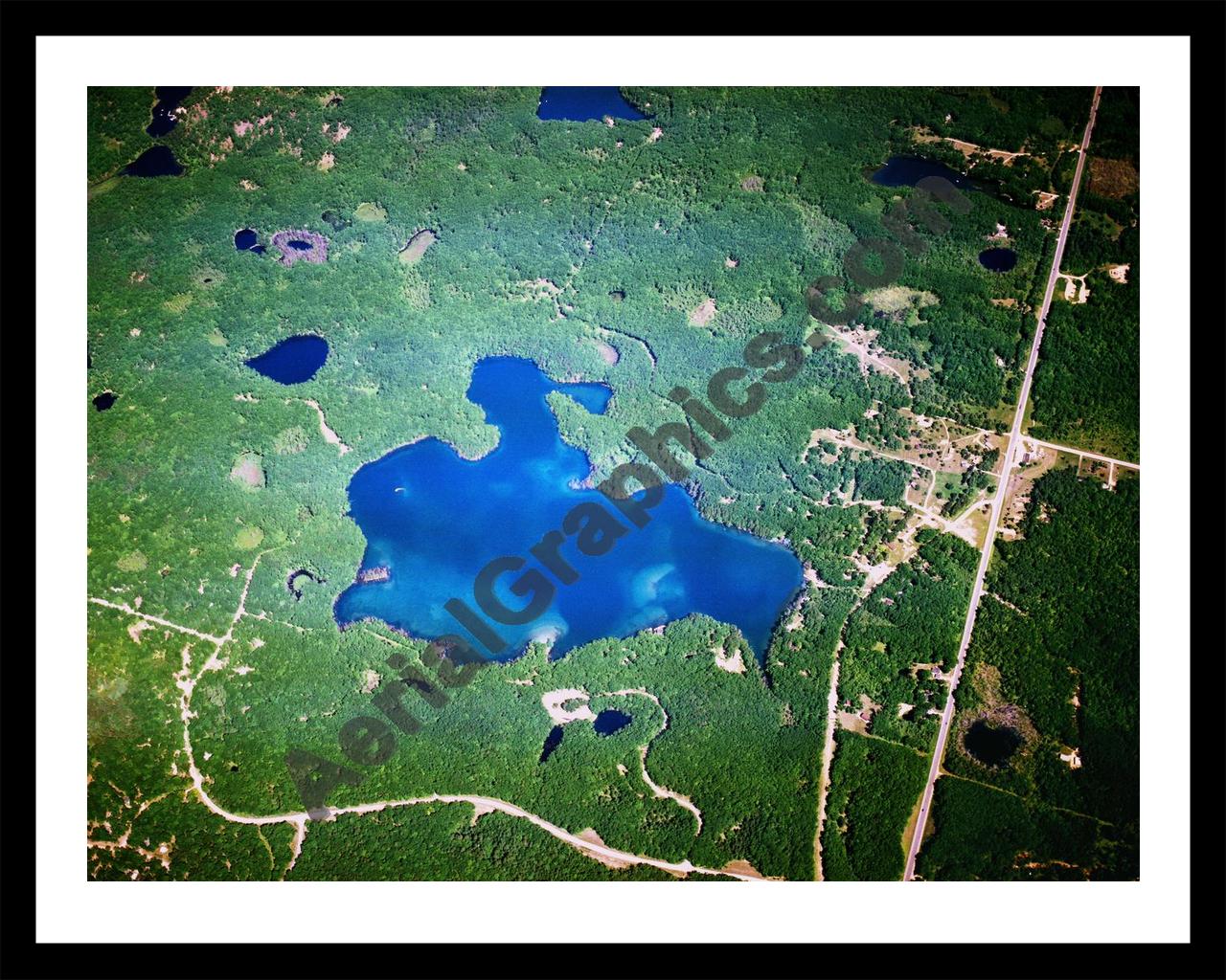 Aerial image of [5848] Loon Lake in Oscoda, MI with Black Metal frame