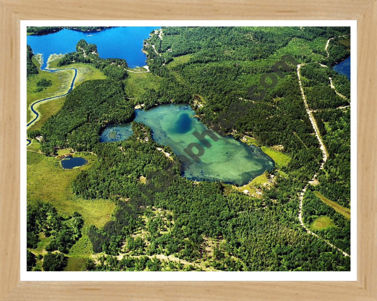 Aerial image of [5849] Lake Louise  in Presque Isle, MI with Natural Wood frame