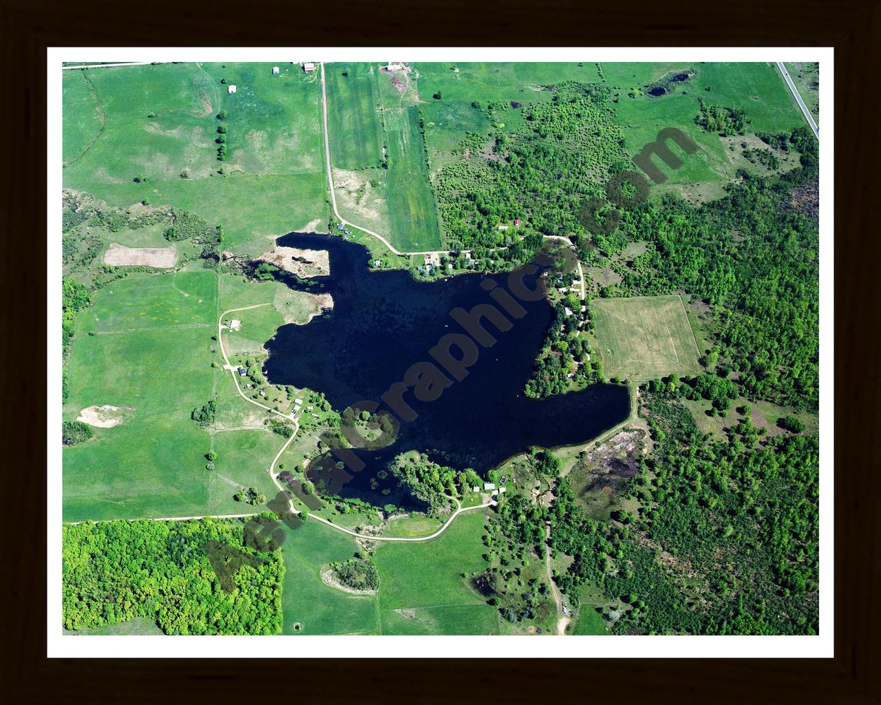 Aerial image of [5855] Lake Maloy in Osceola, MI with Black Wood frame