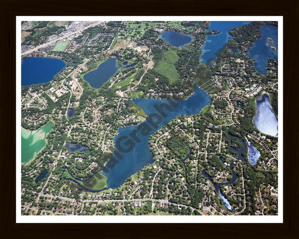 Aerial image of [5863] Upper Long Lake in Oakland, MI with Black Wood frame