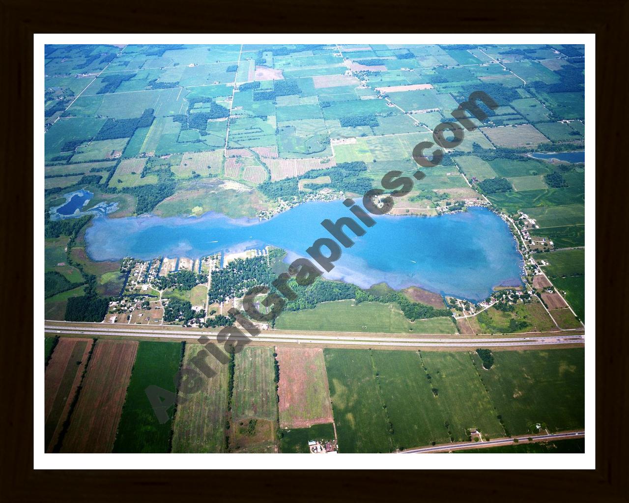 Aerial image of [5871] Pleasant Lake in Stueban, IN with Black Wood frame