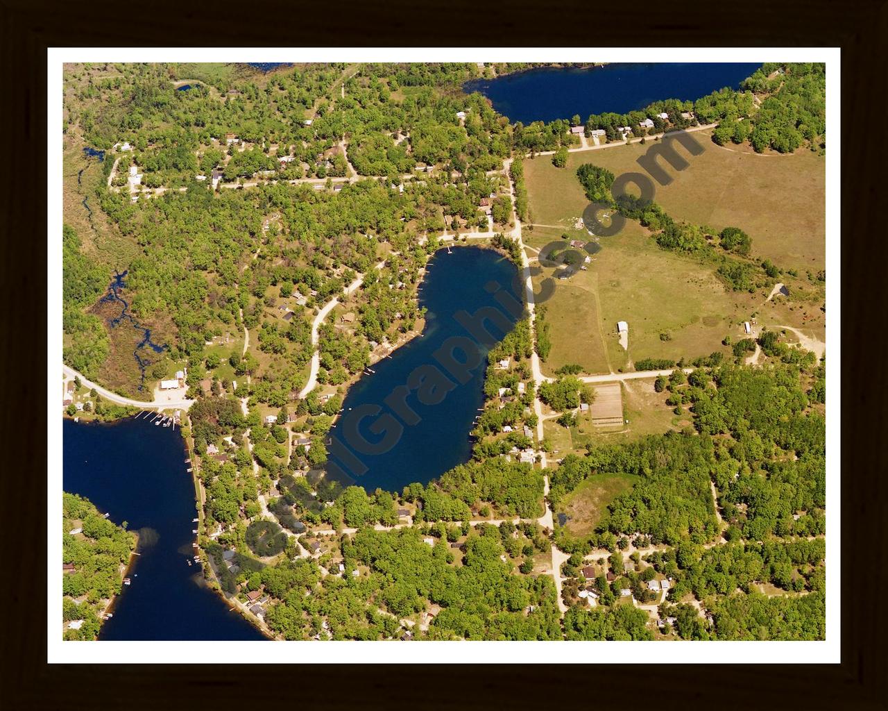 Aerial image of [5878] Bluegill Lake in Clare, MI with Black Wood frame