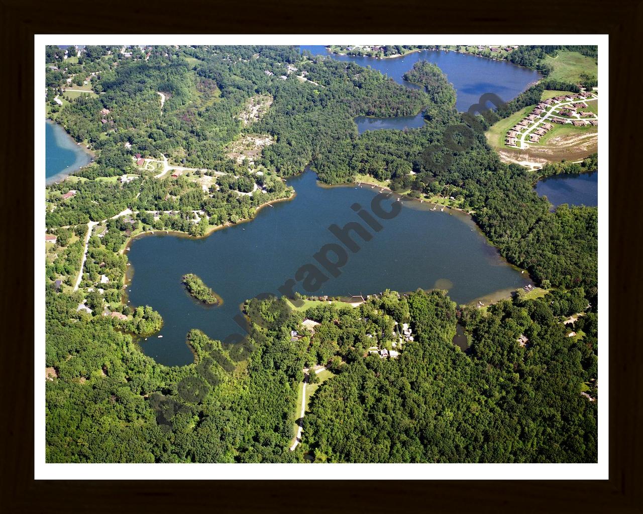 Aerial image of [5880] Sandy Bottom Lake in Livingston, MI with Black Wood frame