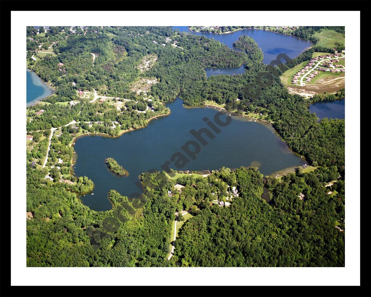 Aerial image of [5880] Sandy Bottom Lake in Livingston, MI with Black Metal frame