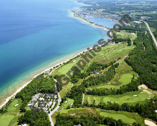 Aerial image of [5891] Bay Harbor Golf Club (looking east) in Emmet, Mi with No frame