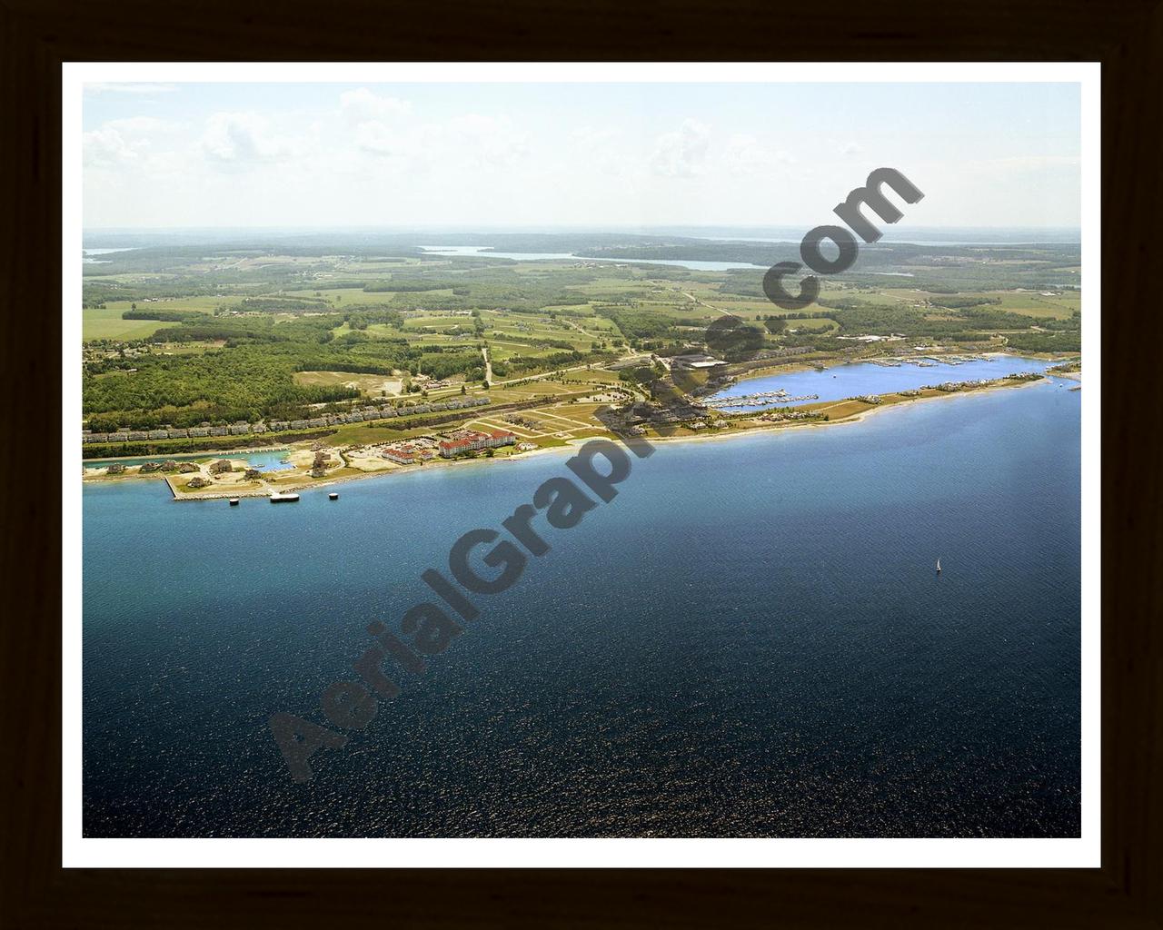 Aerial image of [5893] Bay Harbor in Emmet, Mi with Black Wood frame