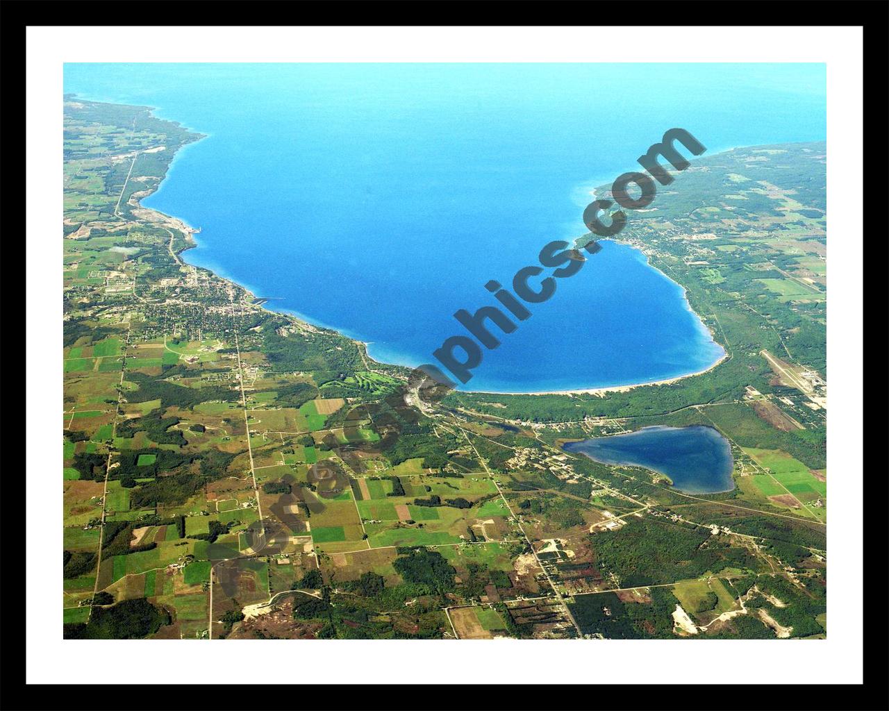 Aerial image of [5894] Little Traverse Bay in Emmet, Mi with Black Metal frame