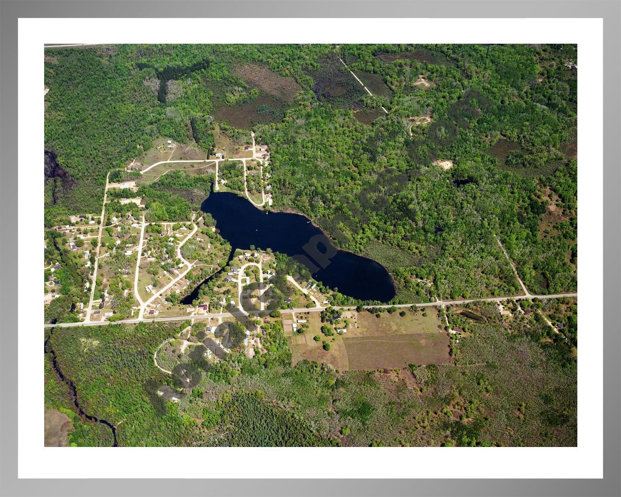 Aerial image of [602] Otter Lake in Clare, MI with Silver Metal frame