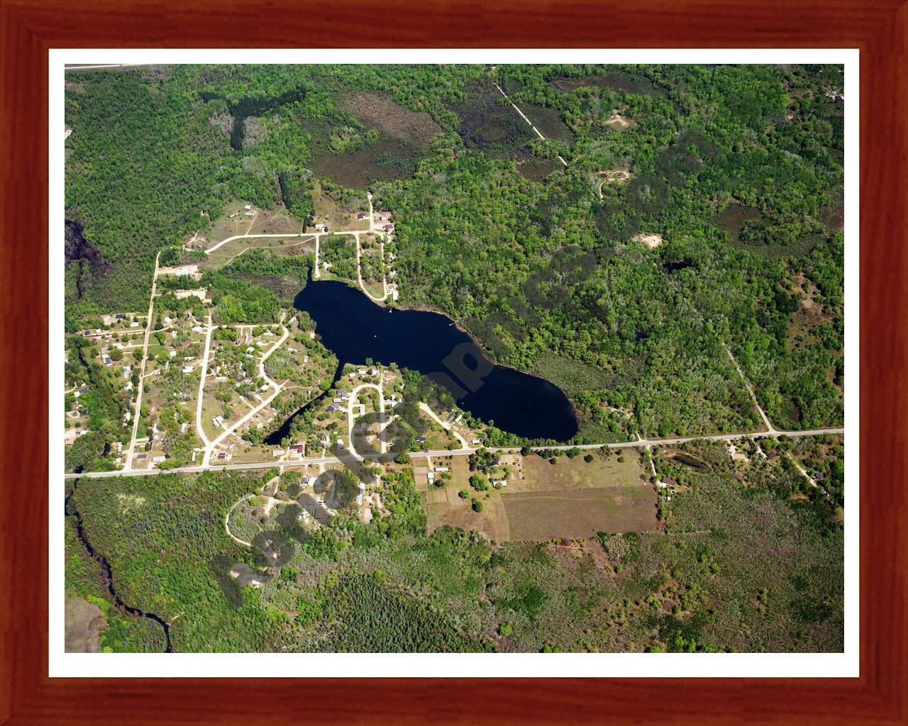 Aerial image of [602] Otter Lake in Clare, MI with Cherry Wood frame