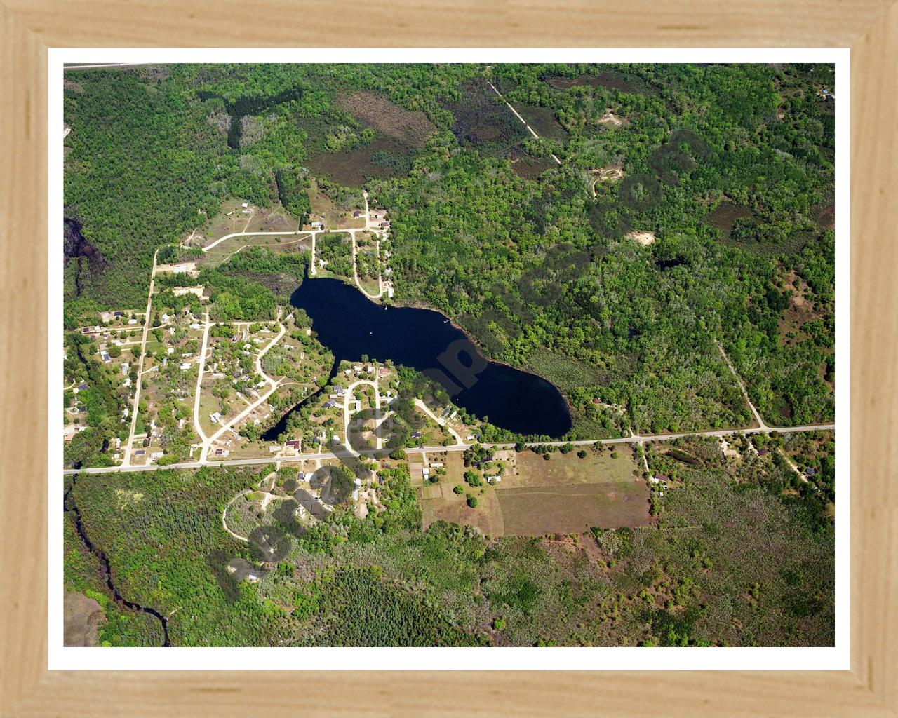 Aerial image of [602] Otter Lake in Clare, MI with Natural Wood frame