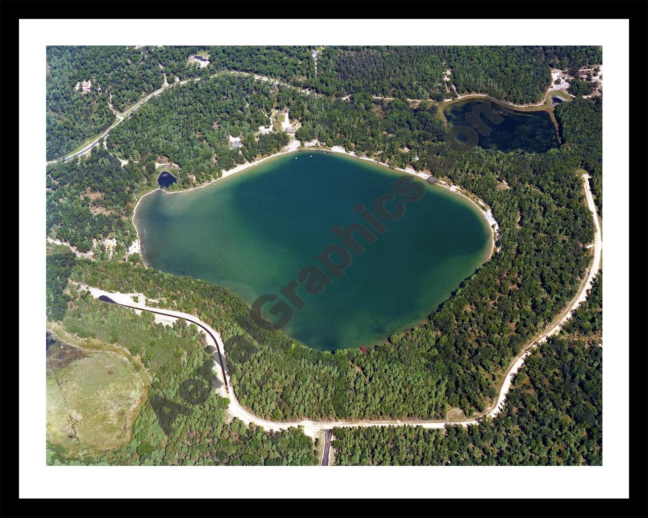 Aerial image of [605] Owasippe Lake in Muskegon, MI with Black Metal frame