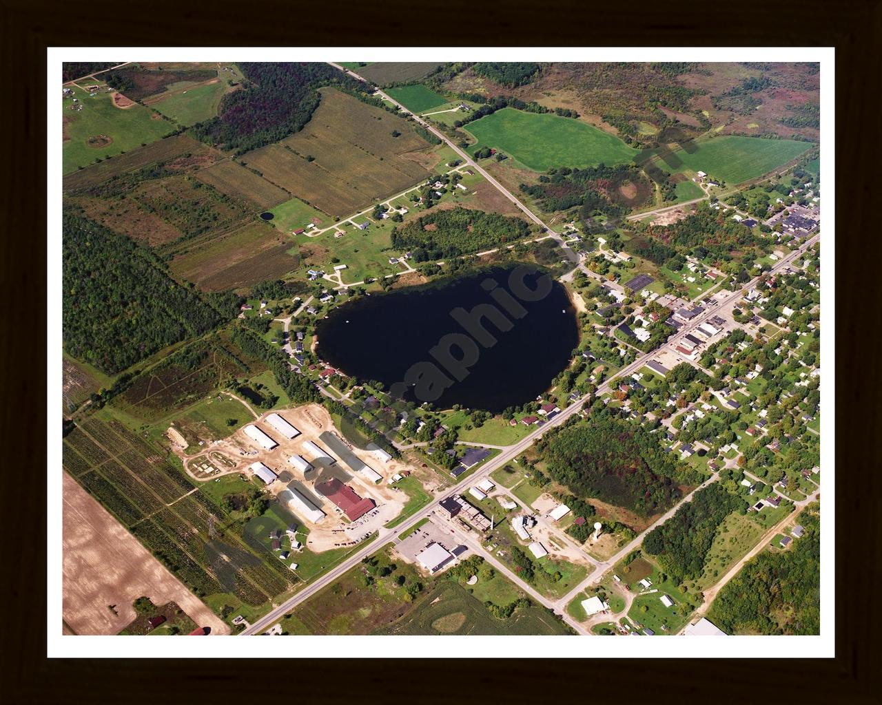 Aerial image of [619] Pearl Lake in Montcalm, MI with Black Wood frame