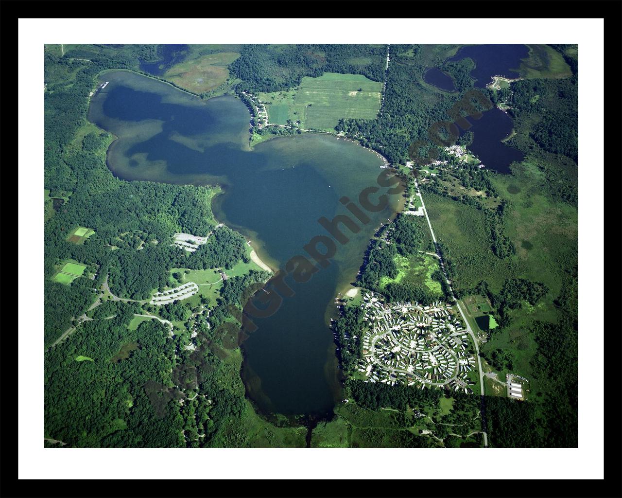 Aerial image of [650] Portage Lake in Jackson, MI with Black Metal frame