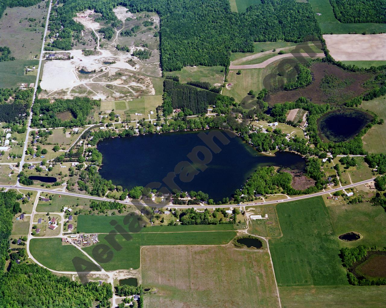 Aerial image of [664] Rock Lake in Montcalm, MI with Canvas Wrap frame