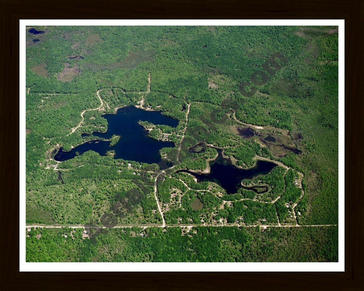 Aerial image of [747] Springwood Lakes in Clare, MI with Black Wood frame