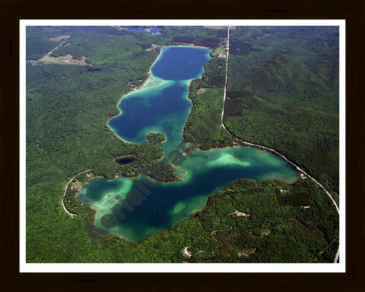 Aerial image of [793] Thumb Lake in Charlevoix, MI with Black Wood frame