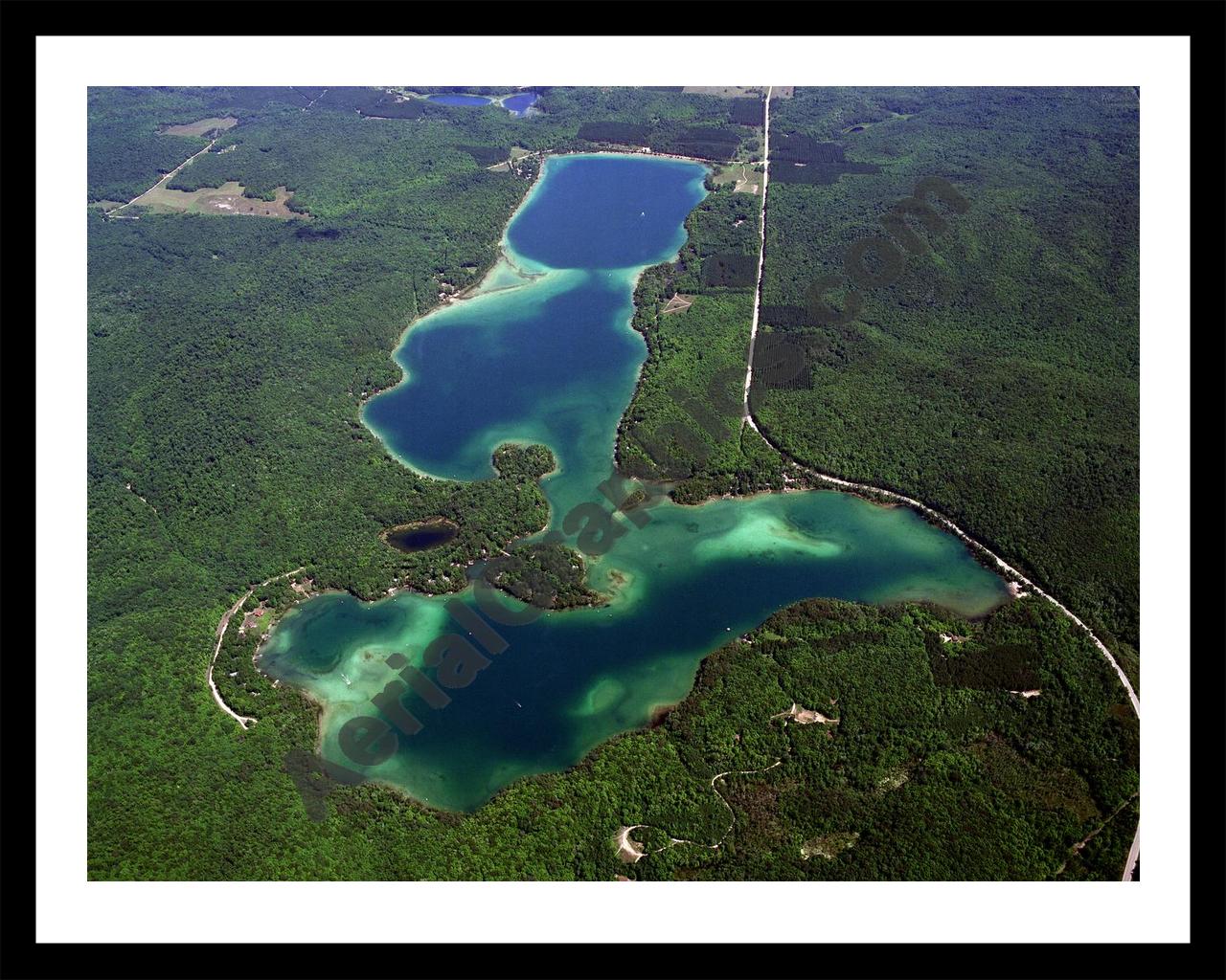 Aerial image of [793] Thumb Lake in Charlevoix, MI with Black Metal frame