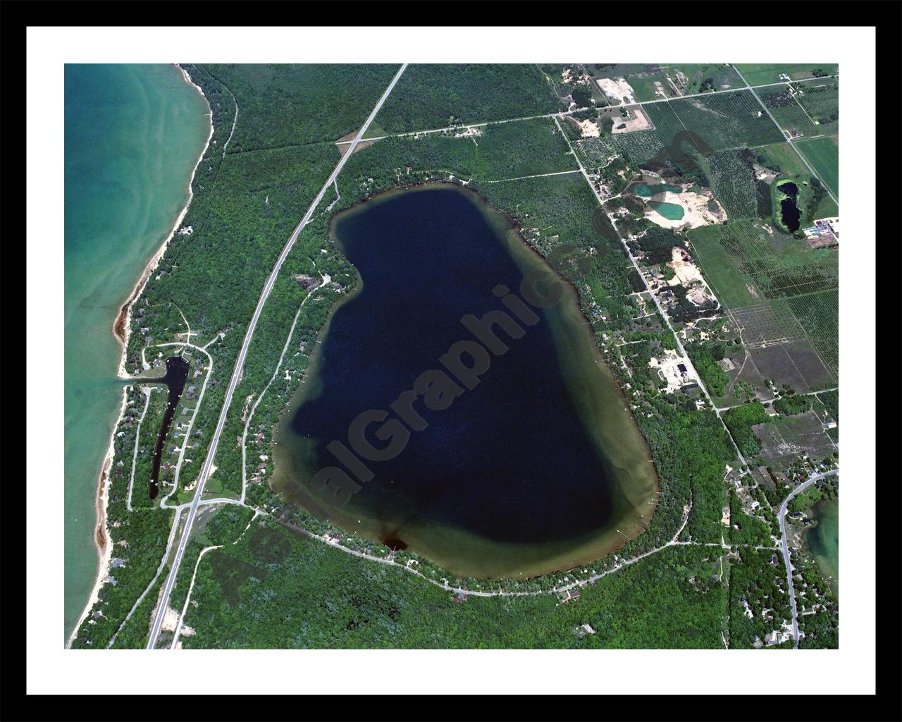 Aerial image of [85] Birch Lake in Antrim, MI with Black Metal frame